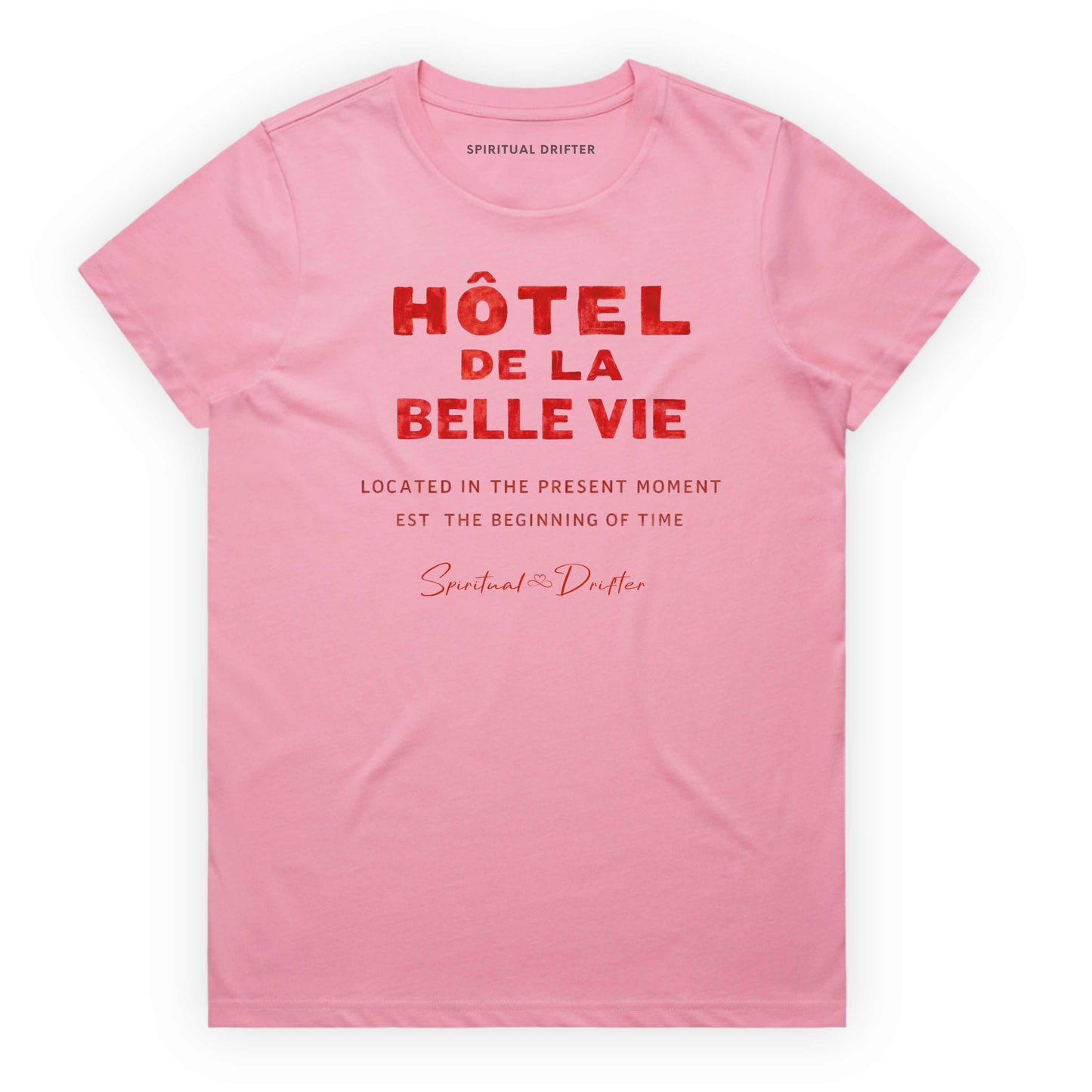 Bubblegum Pink Spiritual Drifter t-shirt with red text 'Hôtel de la Belle Vie' on a white background. Conscious clothing for awakened souls.