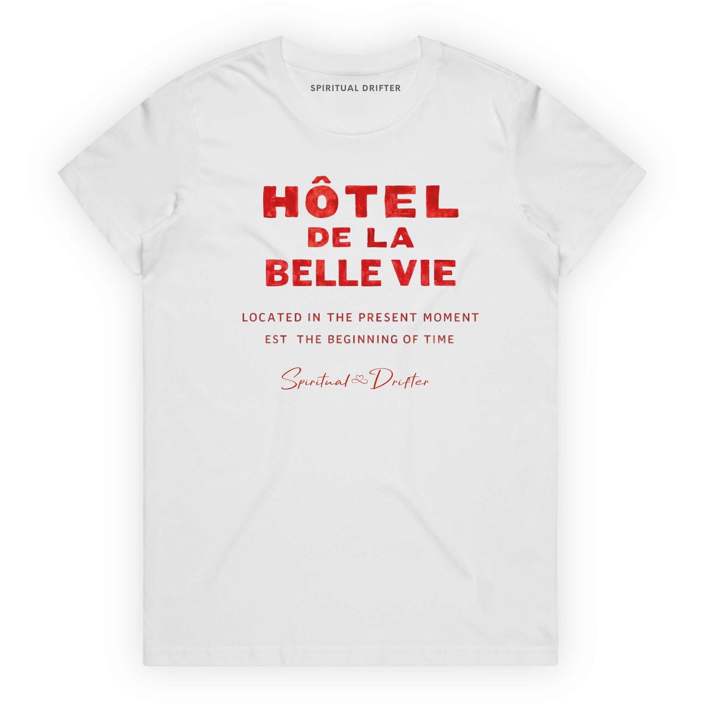 White Spiritual Drifter t-shirt with red text 'Hôtel de la Belle Vie' on a white background. Conscious clothing for awakened souls.