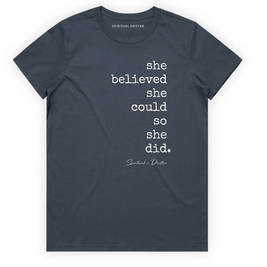 Spiritual Drifter “She Believed she could” graphic 100% cotton t-shirt in petrol. Spiritual lifestyle, positive vibes, aligned, positive mindset, conscious living & yoga clothing. Spiritual apparel inspired by modern mysticism, meditation, matcha, manifestation and sacred medicine and conscious living. Yoga and meditation clothing for awakened souls.