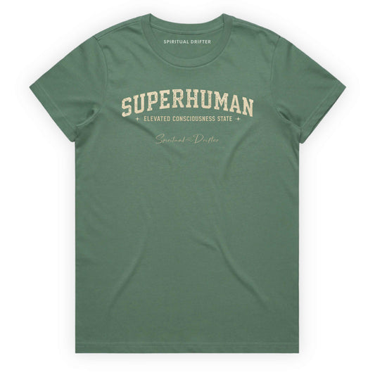 Sage Green Spiritual Drifter t-shirt with 'Superhuman' varsity style text on a white background. Elevated spiritual apparel inspired by meditation, mindfulness, yoga, positive vibes, law of attraction and conscious living. Become Superhuman in this elevated natural fashion tee for women.