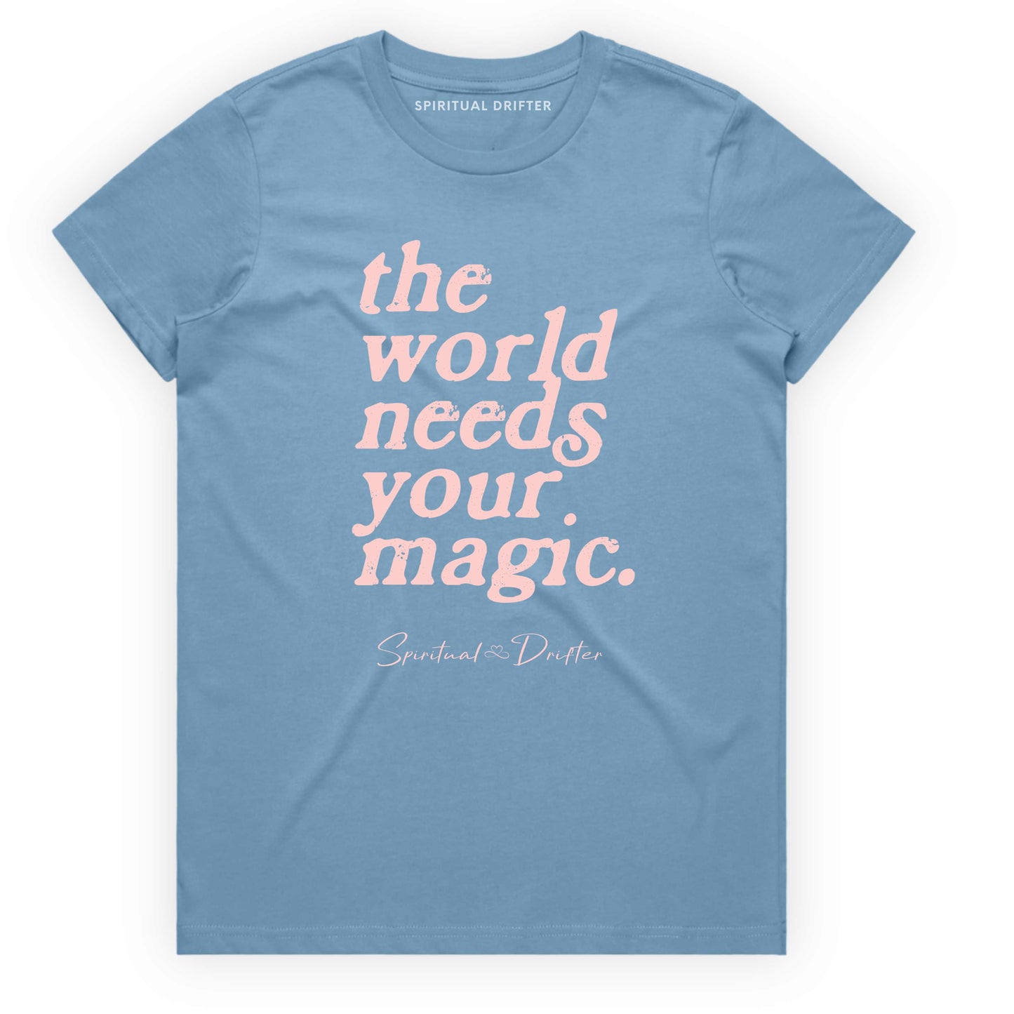 Carolina light Blue Spiritual Drifter t-shirt with 'the world needs your magic' text on a white background. Spiritual lifestyle infinite yoga apparel, positive vibes, conscious aware, healthy lifestyle living clothing.