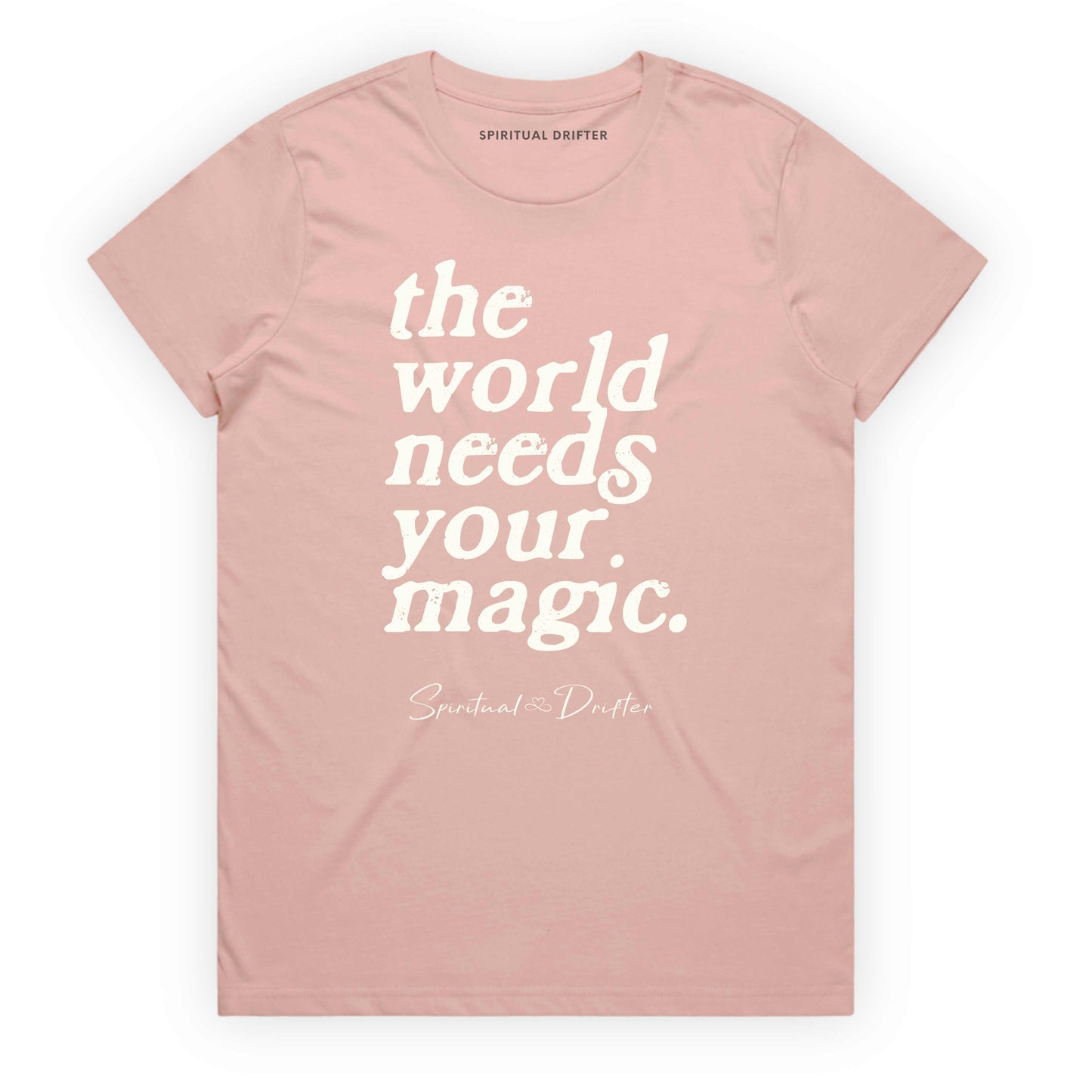Pink Spiritual Drifter t-shirt with 'the world needs your magic' text on a white background. Spiritual lifestyle infinite yoga apparel, positive vibes, conscious aware, healthy lifestyle living clothing.