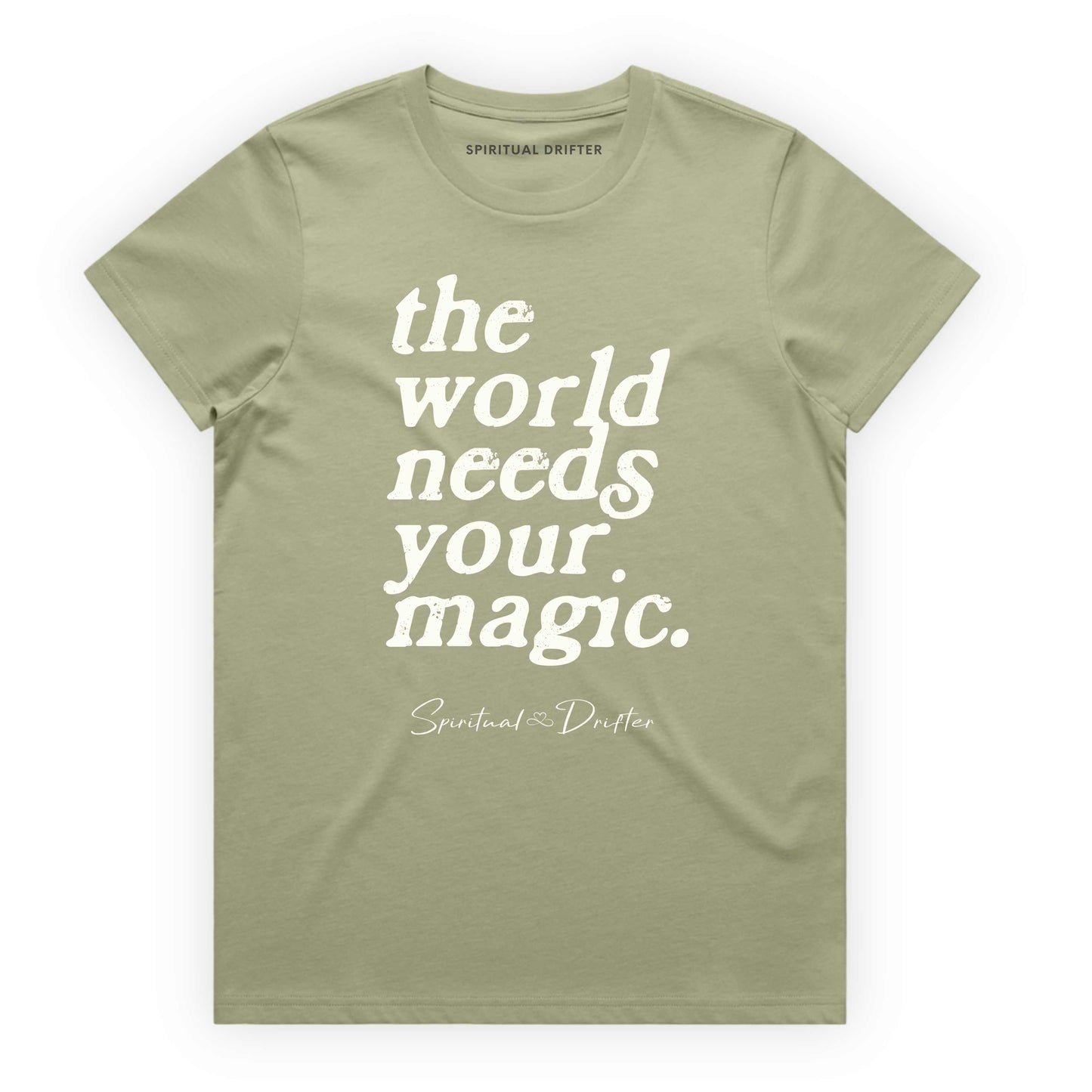 Pistachio Green Spiritual Drifter t-shirt with 'the world needs your magic' text on a white background. Spiritual lifestyle infinite yoga apparel, positive vibes, conscious aware, healthy lifestyle living clothing.