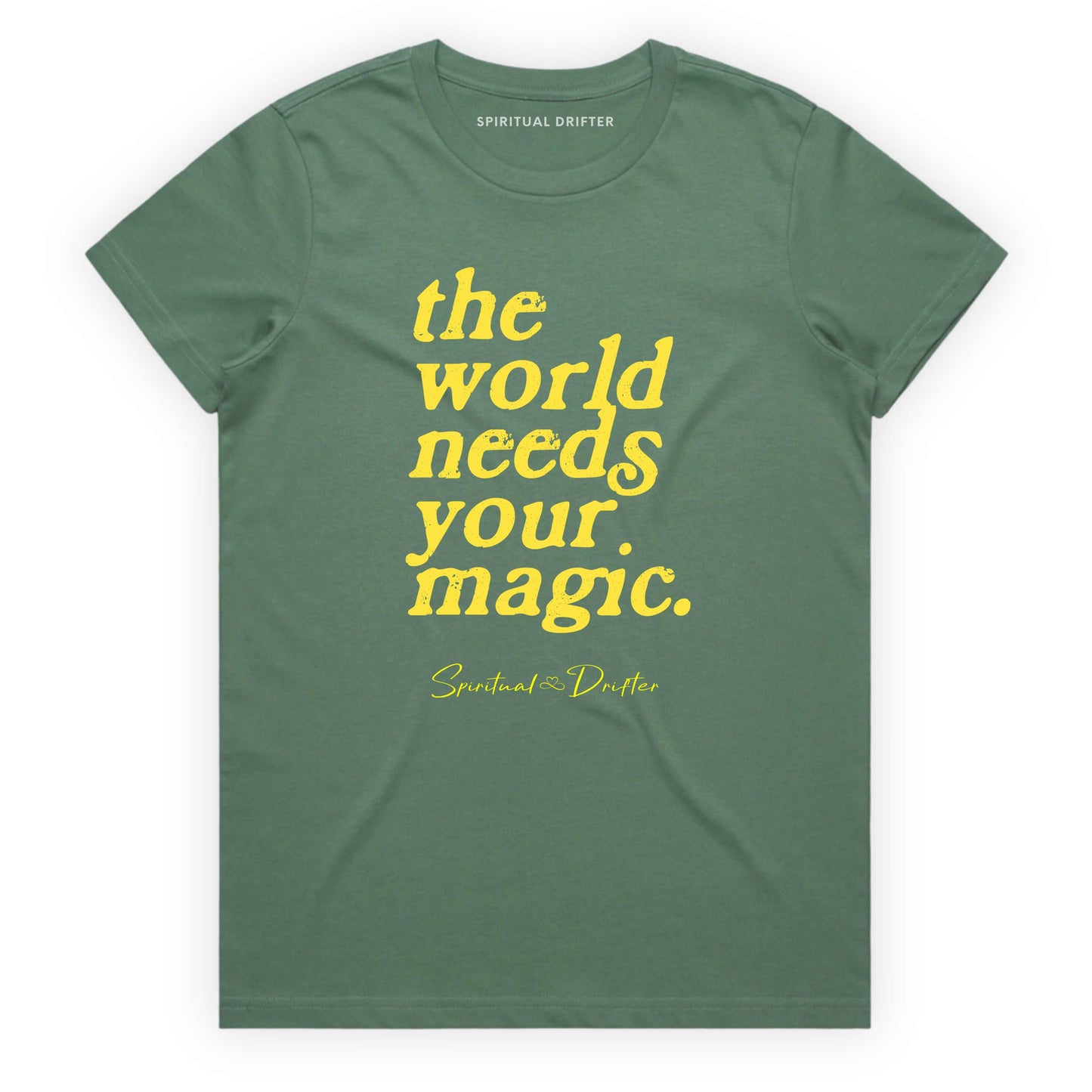 Green sage Spiritual Drifter t-shirt with 'the world needs your magic' text on a white background. Spiritual lifestyle infinite yoga apparel, positive vibes, conscious aware, healthy lifestyle living clothing.background