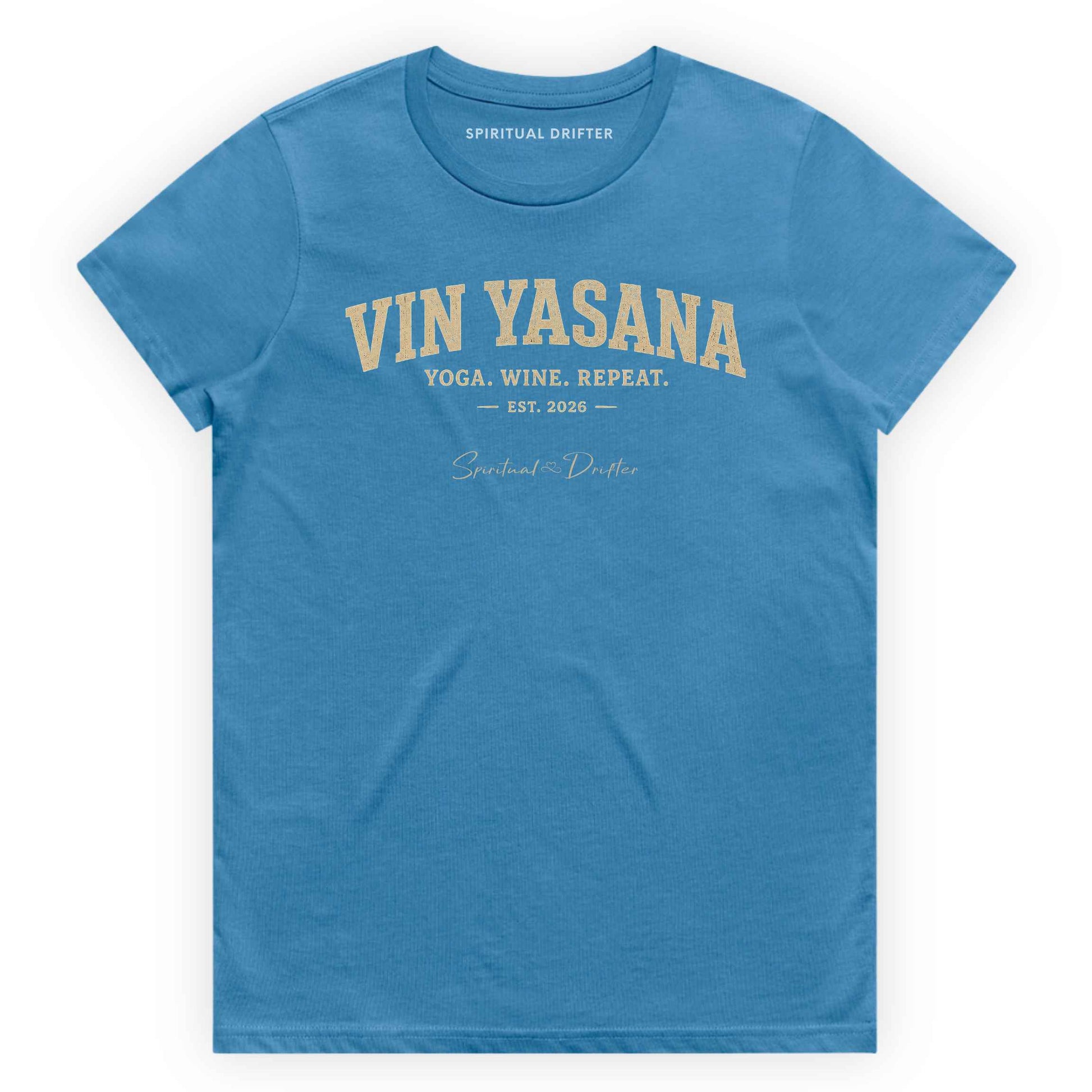 Blue t shirt. Spiritual Drifter Yin Yasana women's graphic t-shirt featuring a yoga and wine inspired design. Conscious lifestyle apparel for yoga lovers, wellness enthusiasts, mindful living, meditation practice, retreat travel, and spiritual growth.