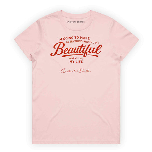 Light ink Spiritual Drifter t-shirt with red text 'I'm going to make everything around me beautiful. That will be my life.' on a white background. Spiritual apparel inspired by modern mysticism, meditation, manifestation, sacred medicine and conscious living. Yoga and meditation clothing for awakened souls.